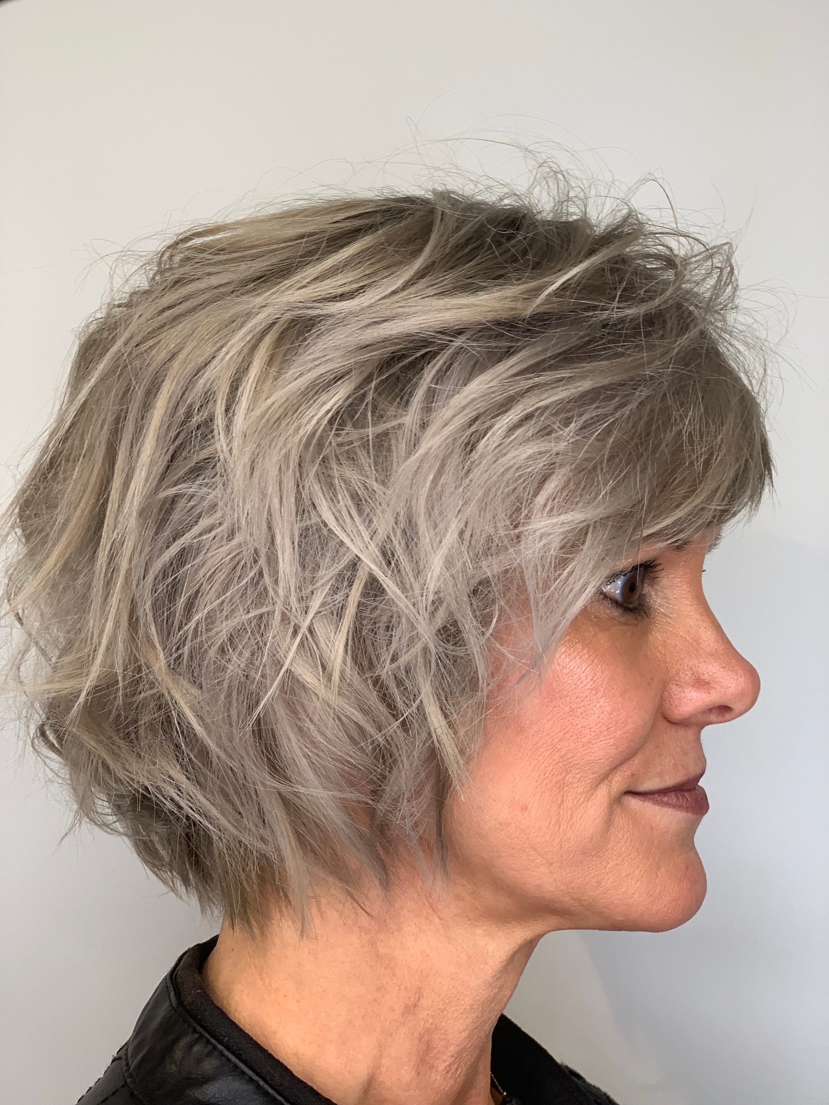 A client of Tyson Daniel Hairdressing with healthy, natural hair in everyday life